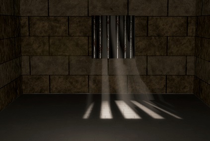 prison cell and window bars with beams of sunlight