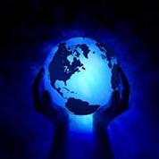 Hands holding glowing blue earth